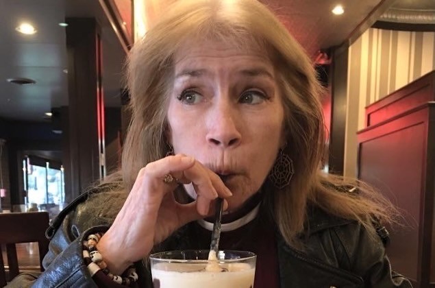 Sharon Gwendolyn Kosinski sipping a milkshake